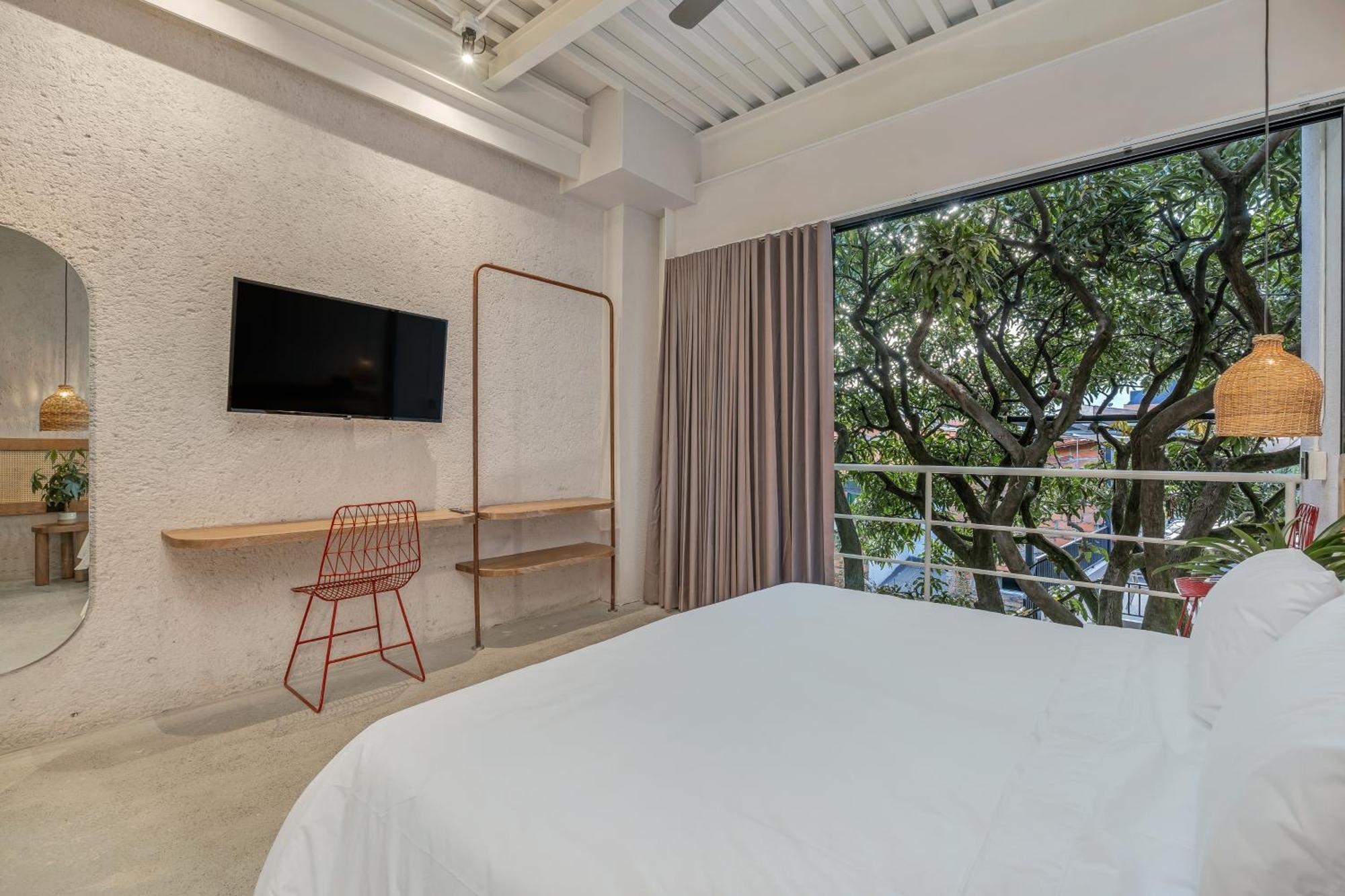 Botanica Casa Hotel Manila By Housy Host Medellín Buitenkant foto